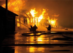 Firemen at work on fire